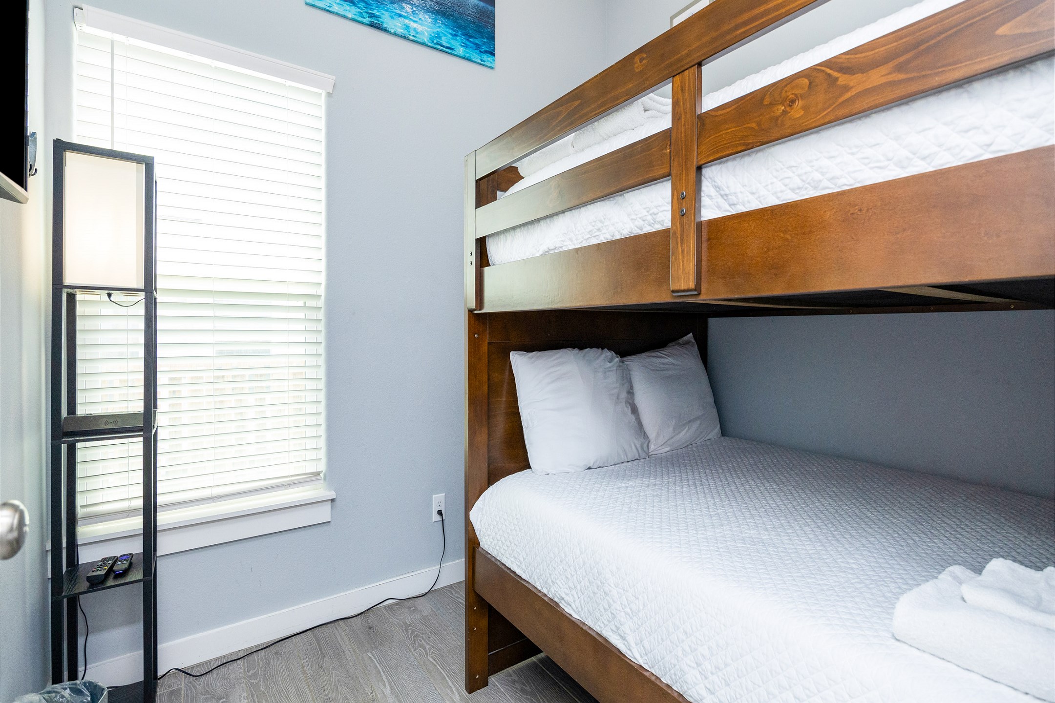 Second bedroom with full over full size bunk bed and flat screen TV