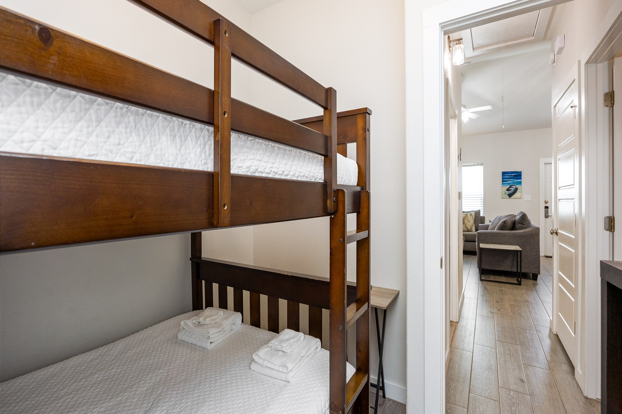 Second bedroom with full over full size bunk bed and flat screen TV