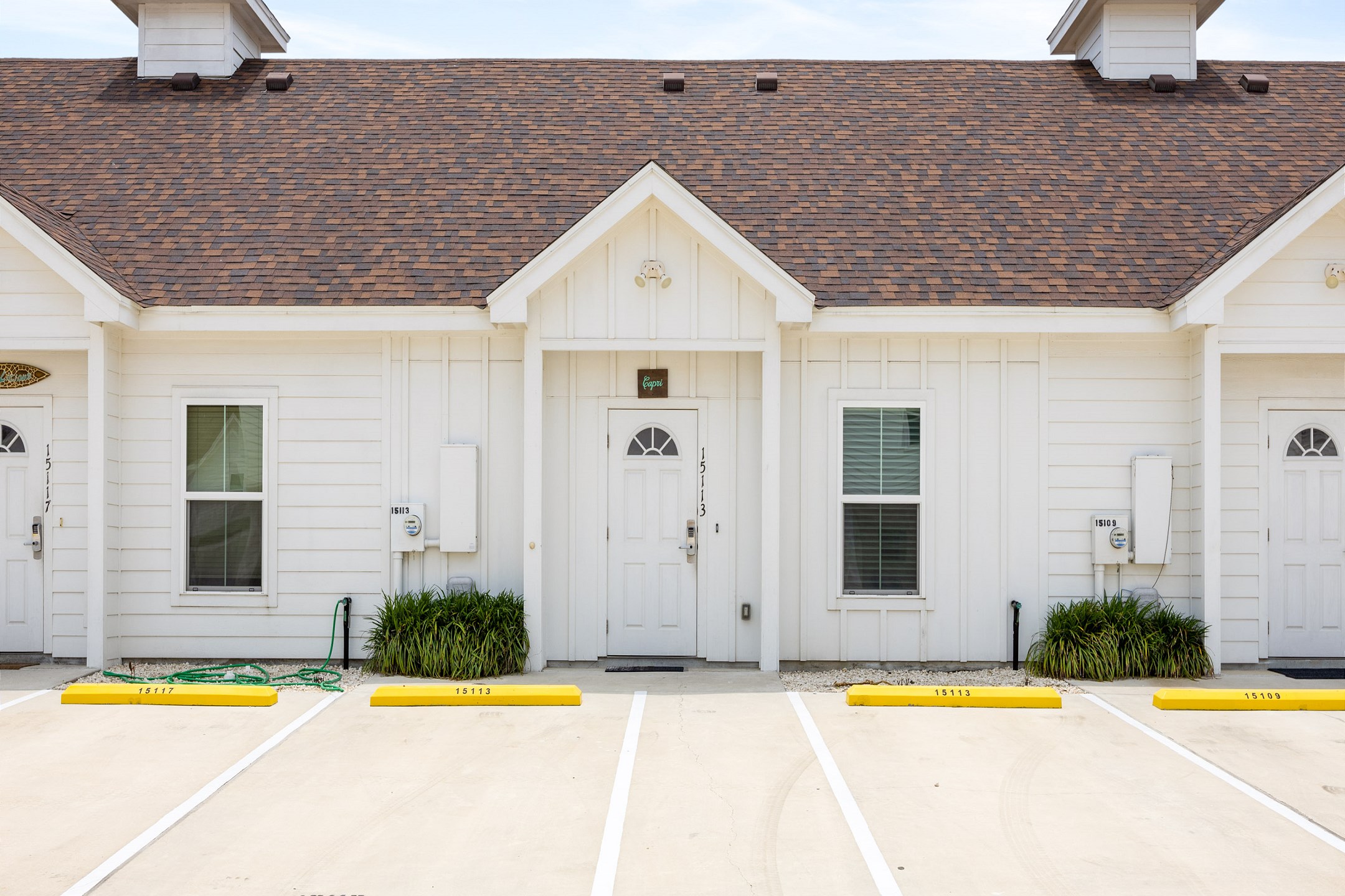 Front entrance to property with coded lock and two reserved parking spaces right out front 