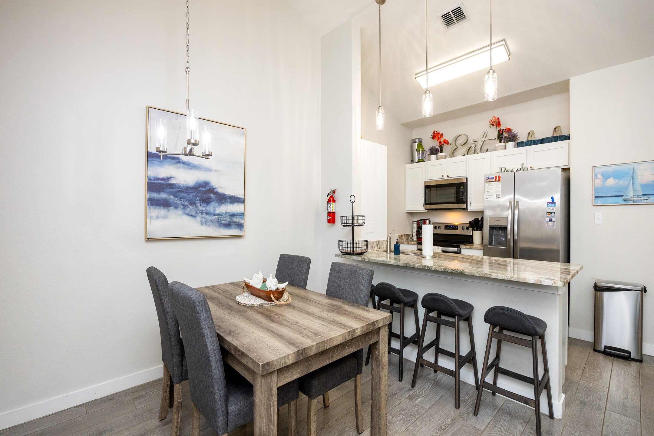 Open-concept layout connecting the dining area to the kitchen