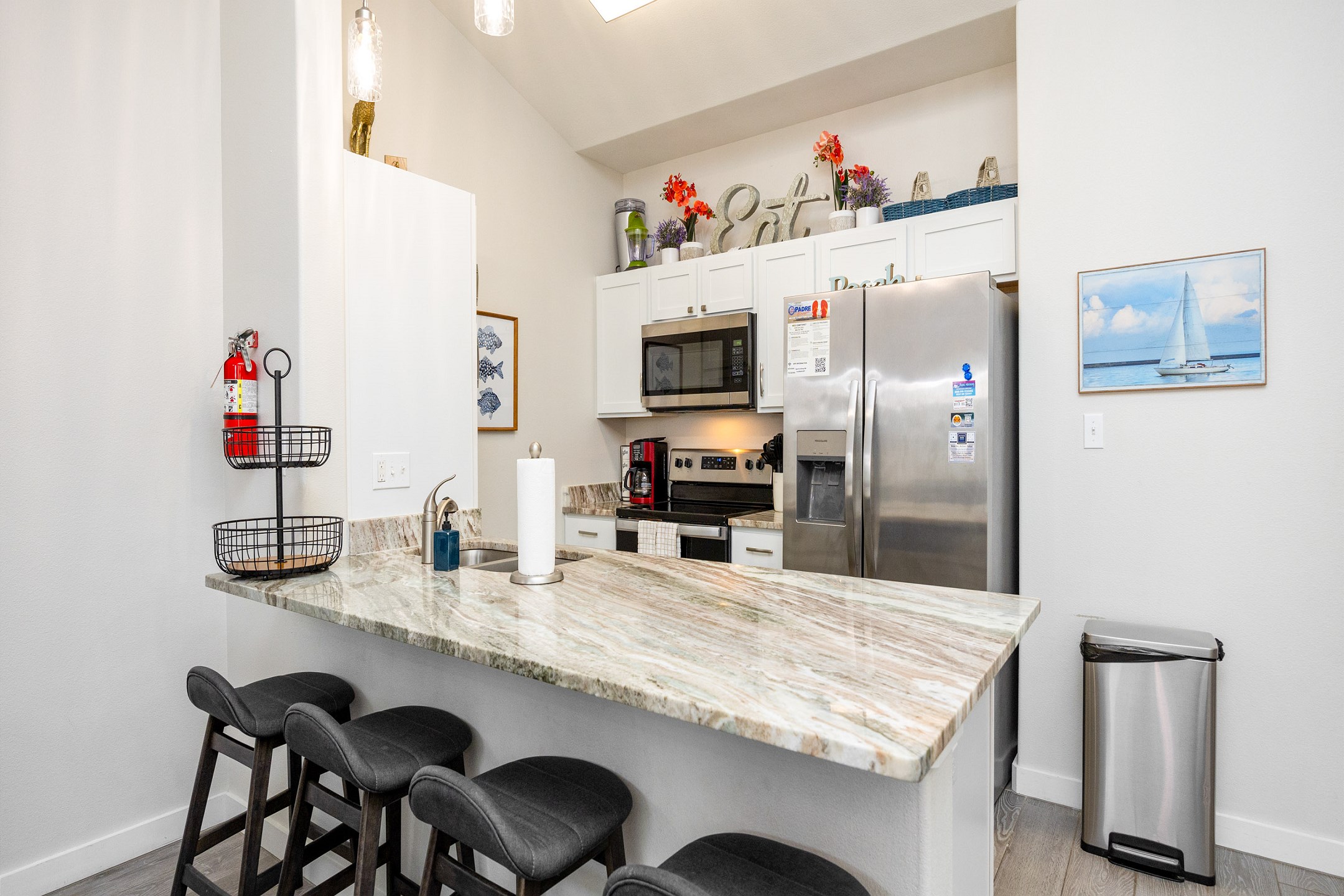 Bright open concept kitchen and breakfast bar