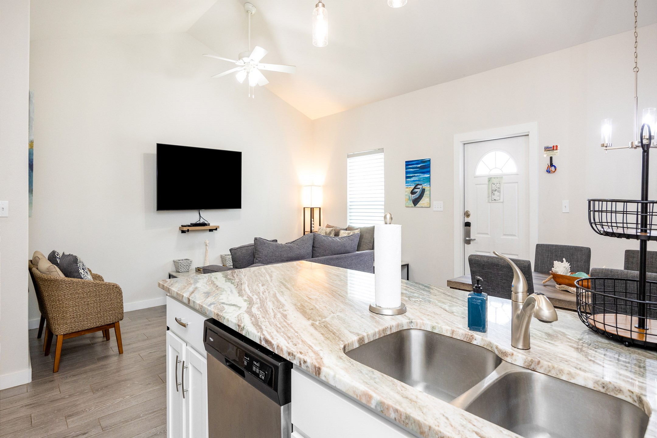 Open-concept layout connecting the dining area to the kitchen