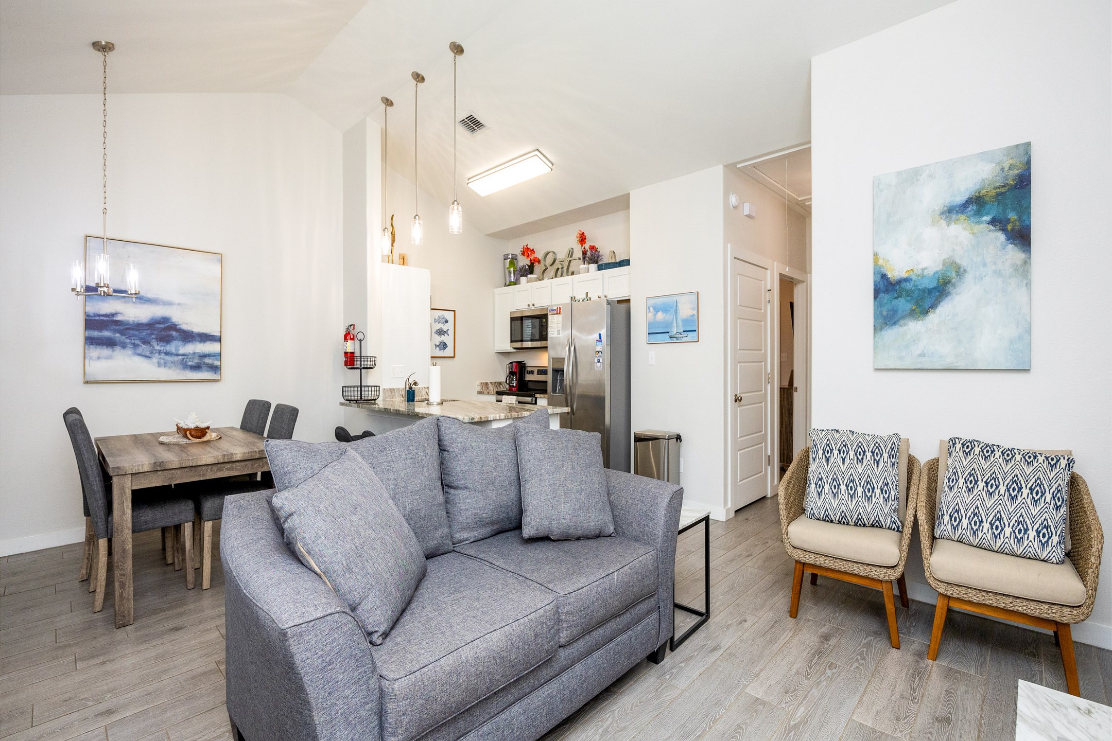 Inviting layout with seamlessly integrated kitchen, dining, and living areas, perfect for creating lasting memories