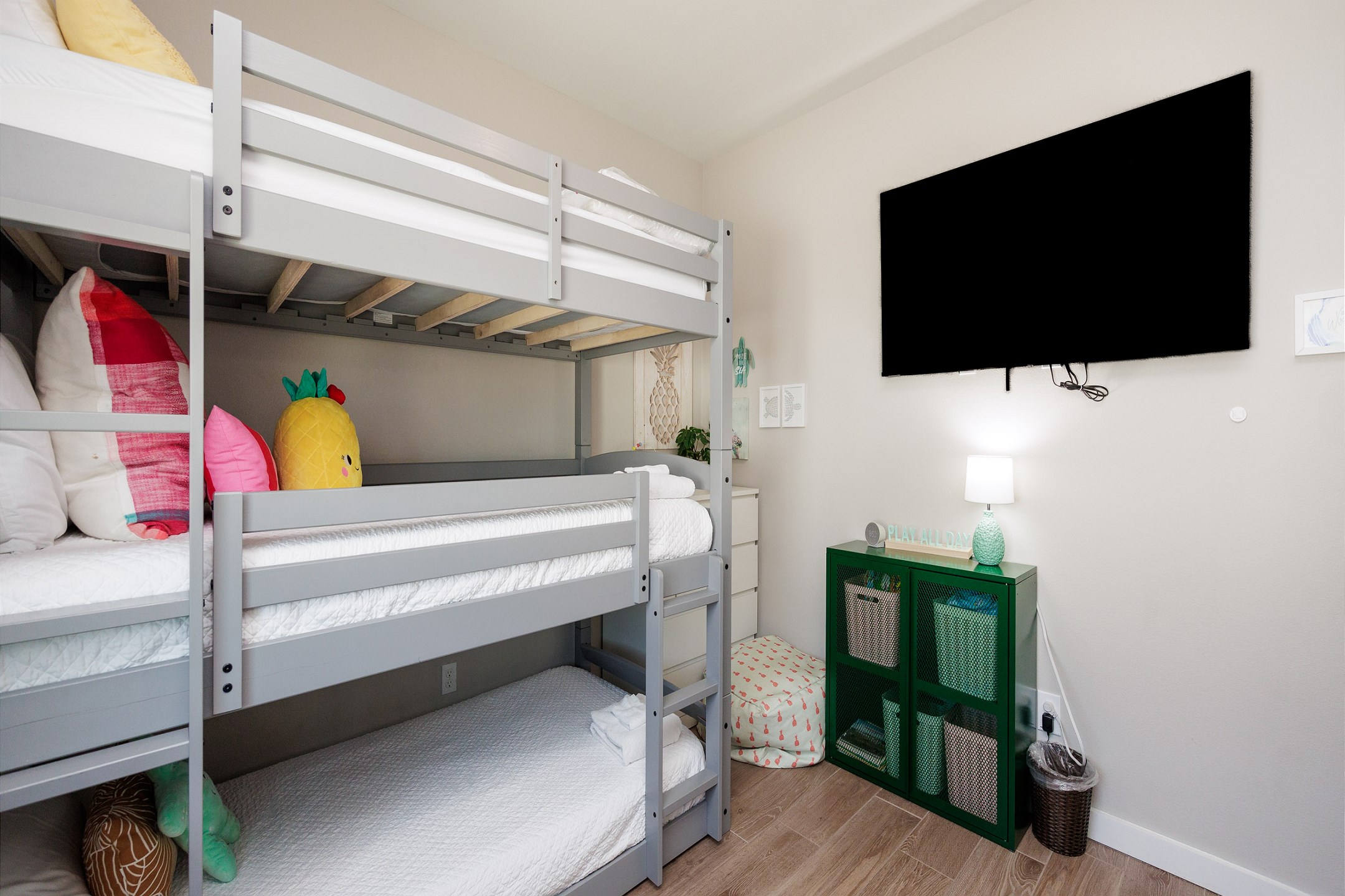Third bedroom on the second floor with two sets of three twin size bunk beds along with flat screen TV