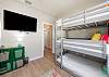 Third bedroom on the second floor with two sets of three twin size bunk beds along with flat screen TV