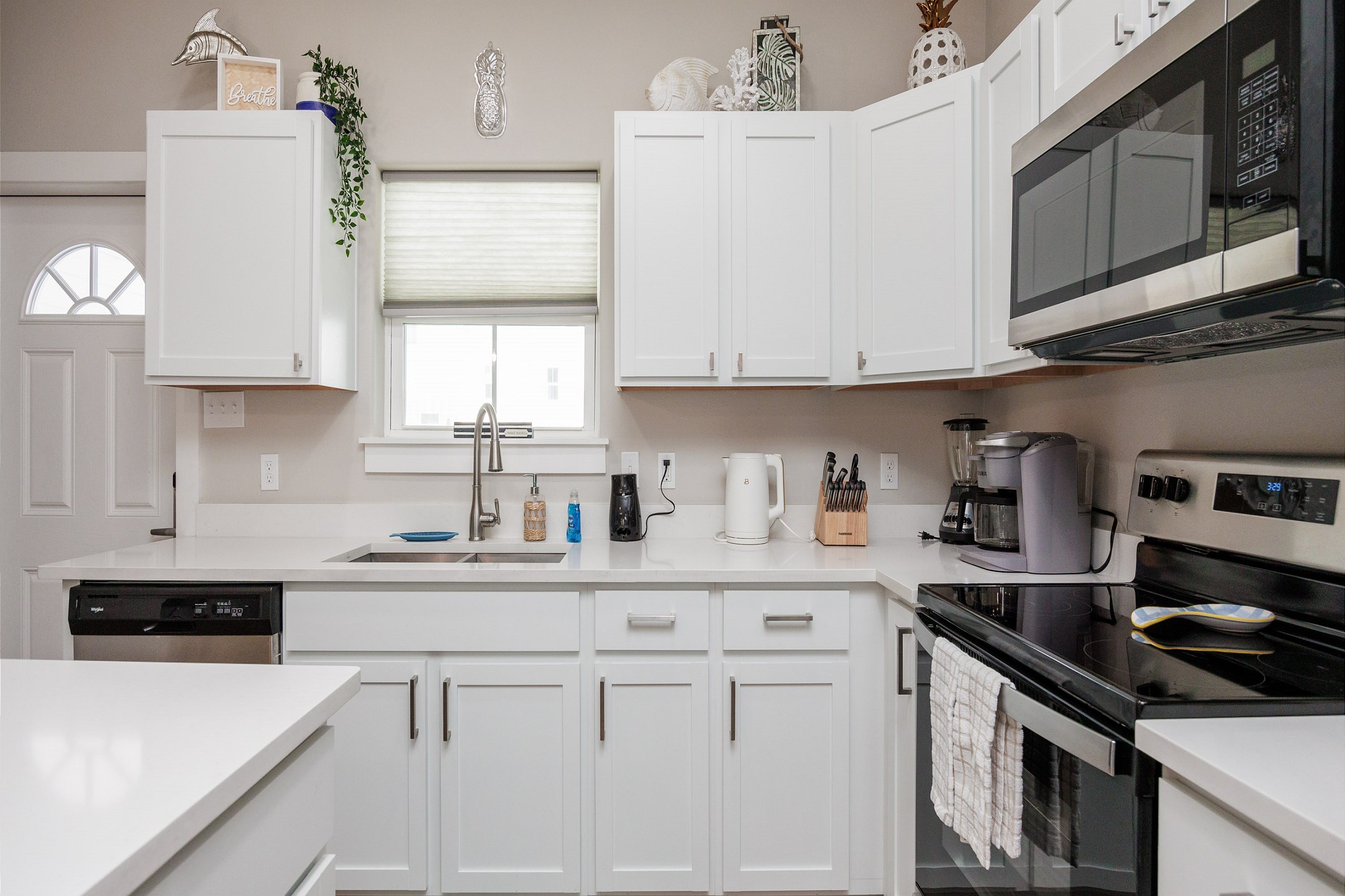 Kitchen area with updated features and plenty of counter space 