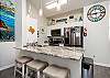 Beautiful kitchen Island with barstools for entertaining 