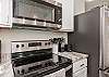 Fully equipped kitchen with stainless steel appliances