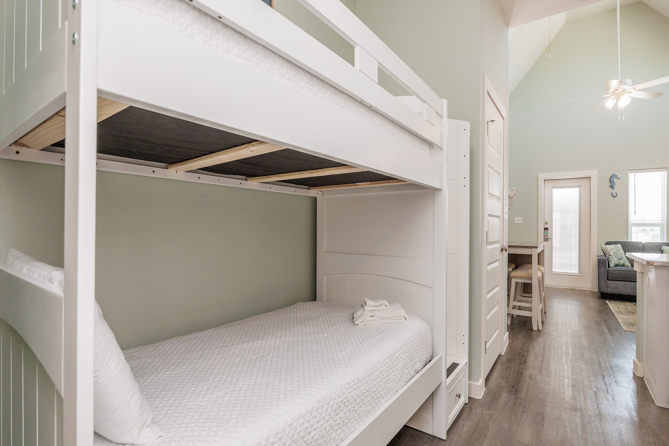 Twin over twin size bunk bed in hallway nook