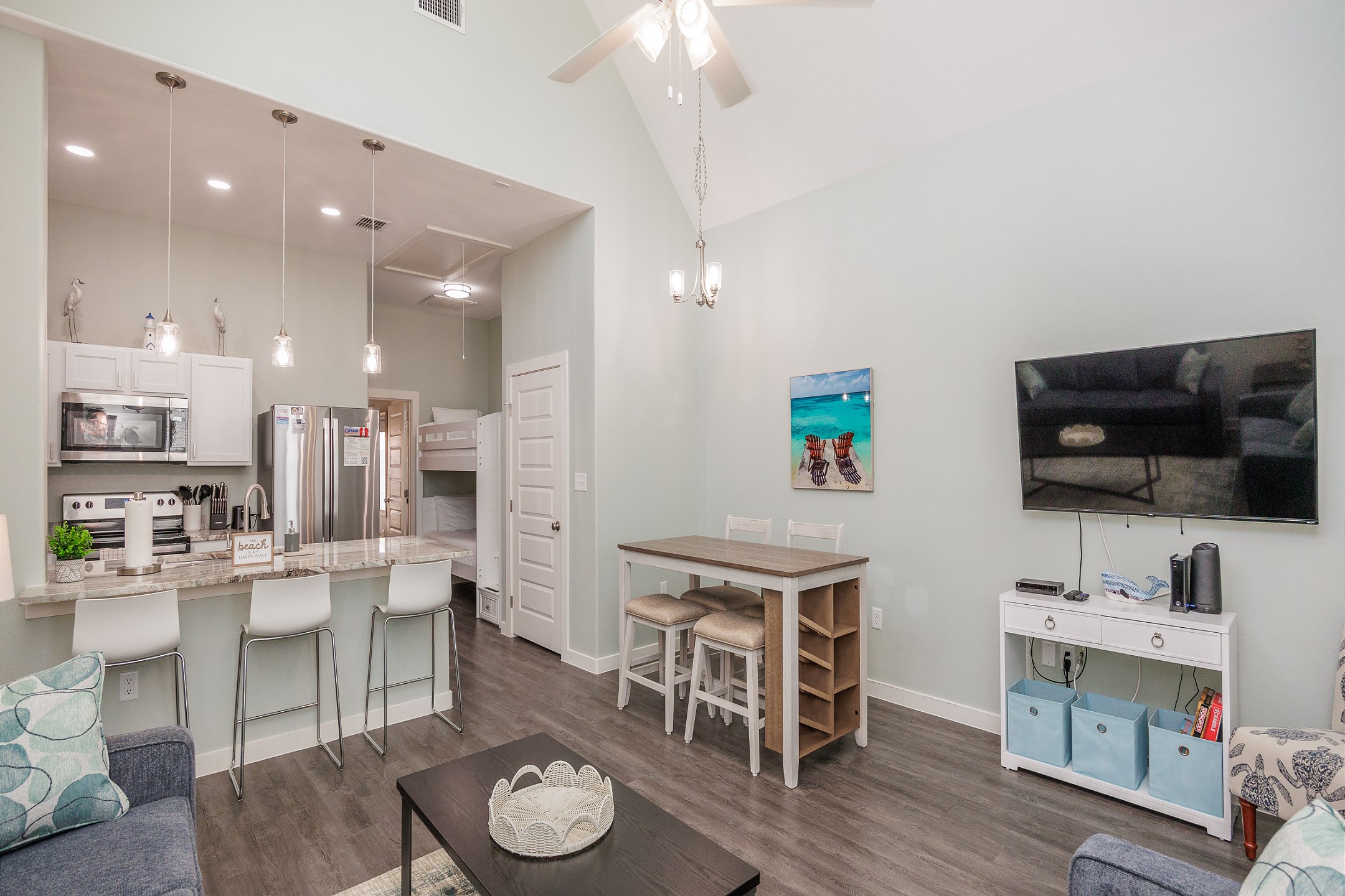 Inviting family hub with seamlessly integrated kitchen, dining, and living areas, perfect for creating lasting memories