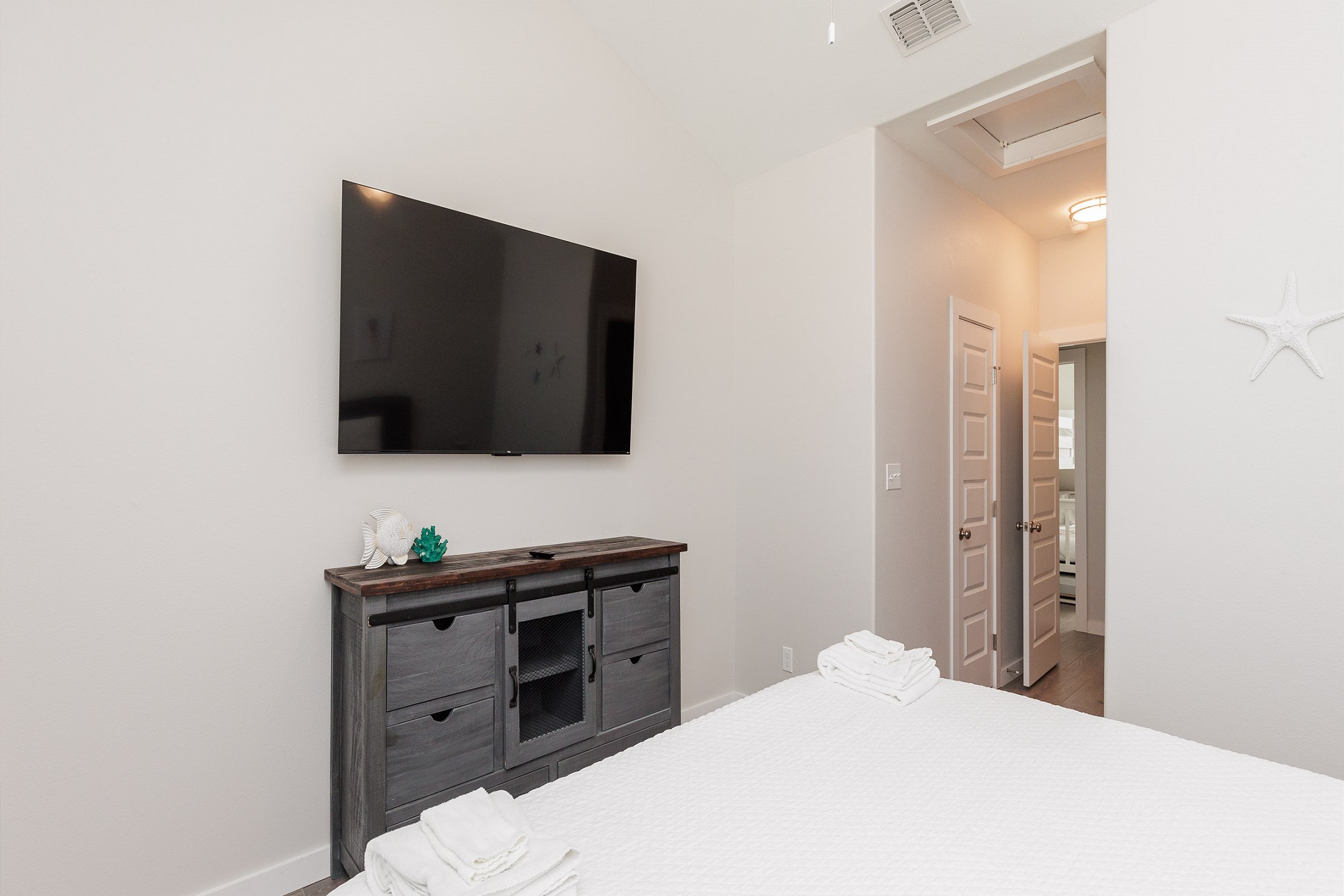 Second bedroom on the second floor with king size bed and flat screen TV