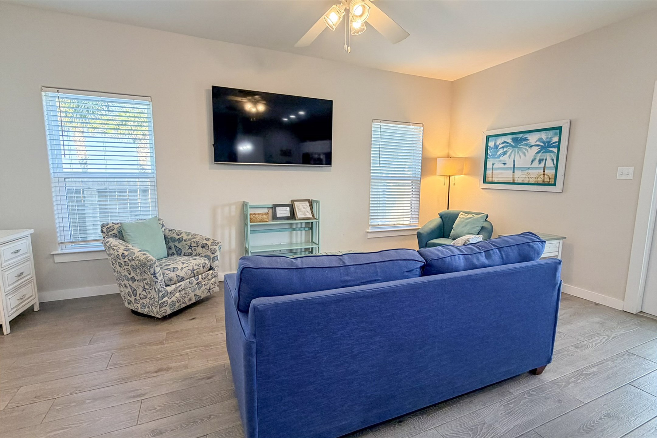 Modern coastal retreat with airy design and entertainment-ready living area