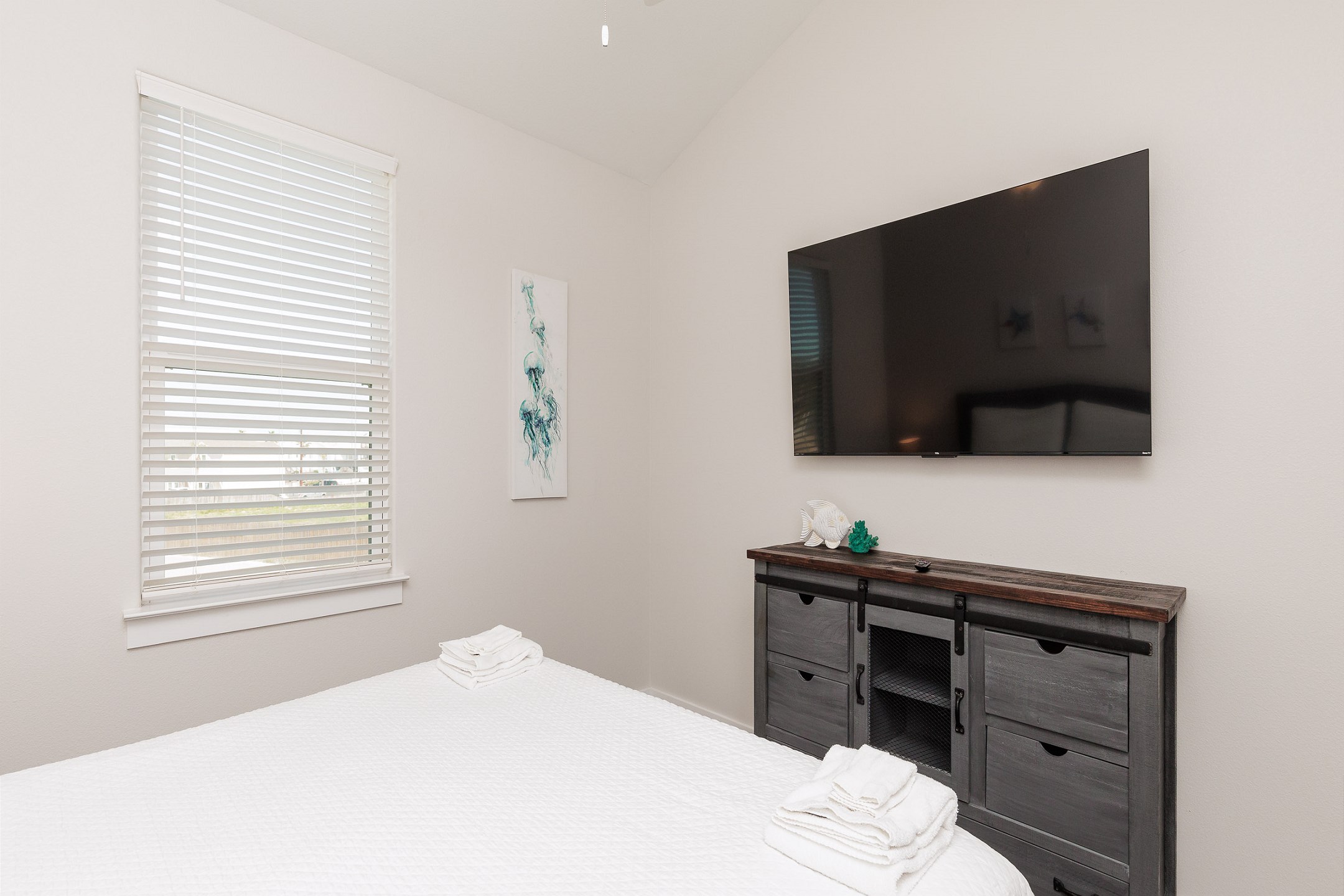 Second bedroom on the second floor with king size bed and flat screen TV