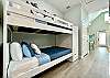 Twin bunkbeds located in hallway nook 