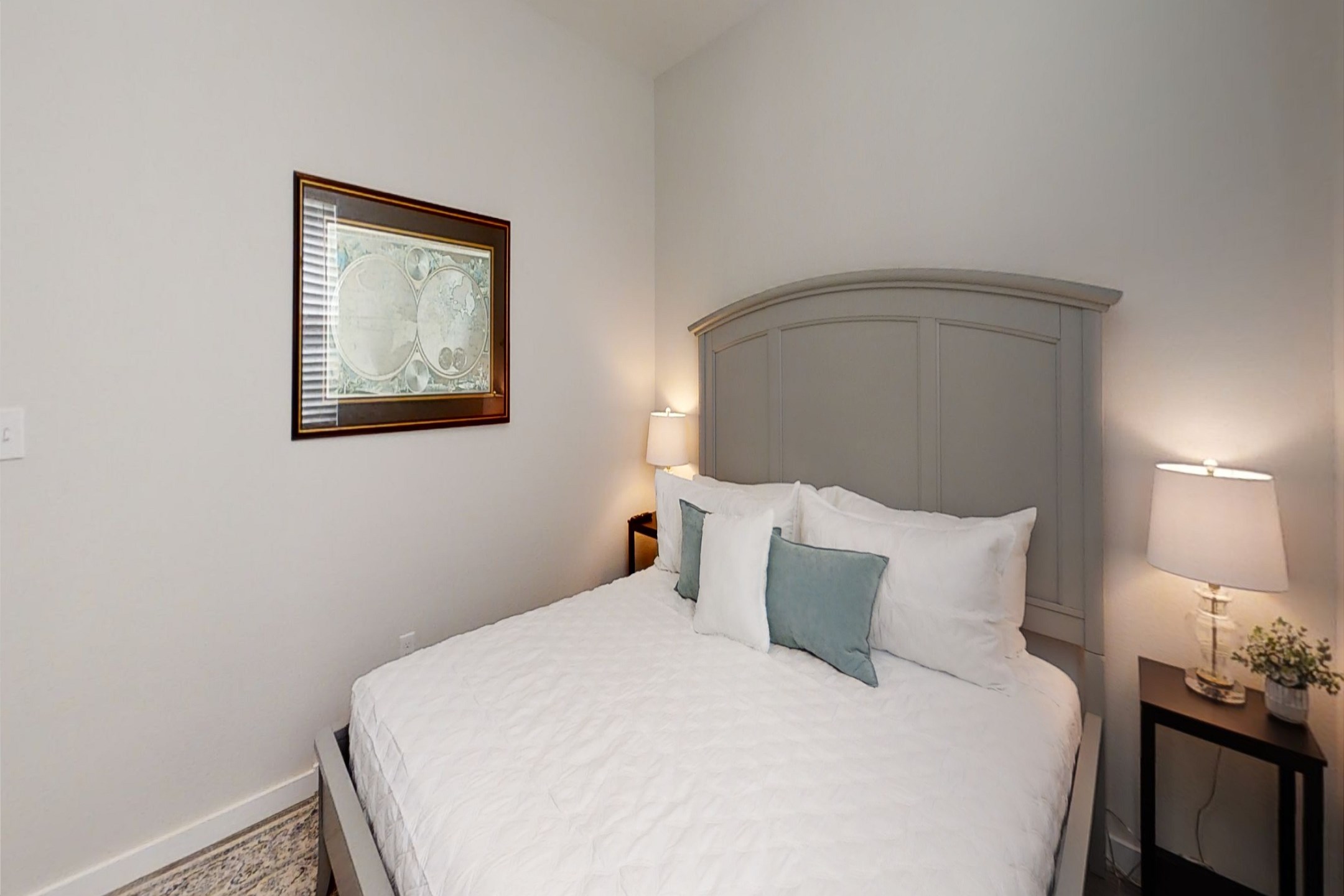 Second bedroom on the second floor with king size bed and twin daybed with twin trundle, along with flat screen TV