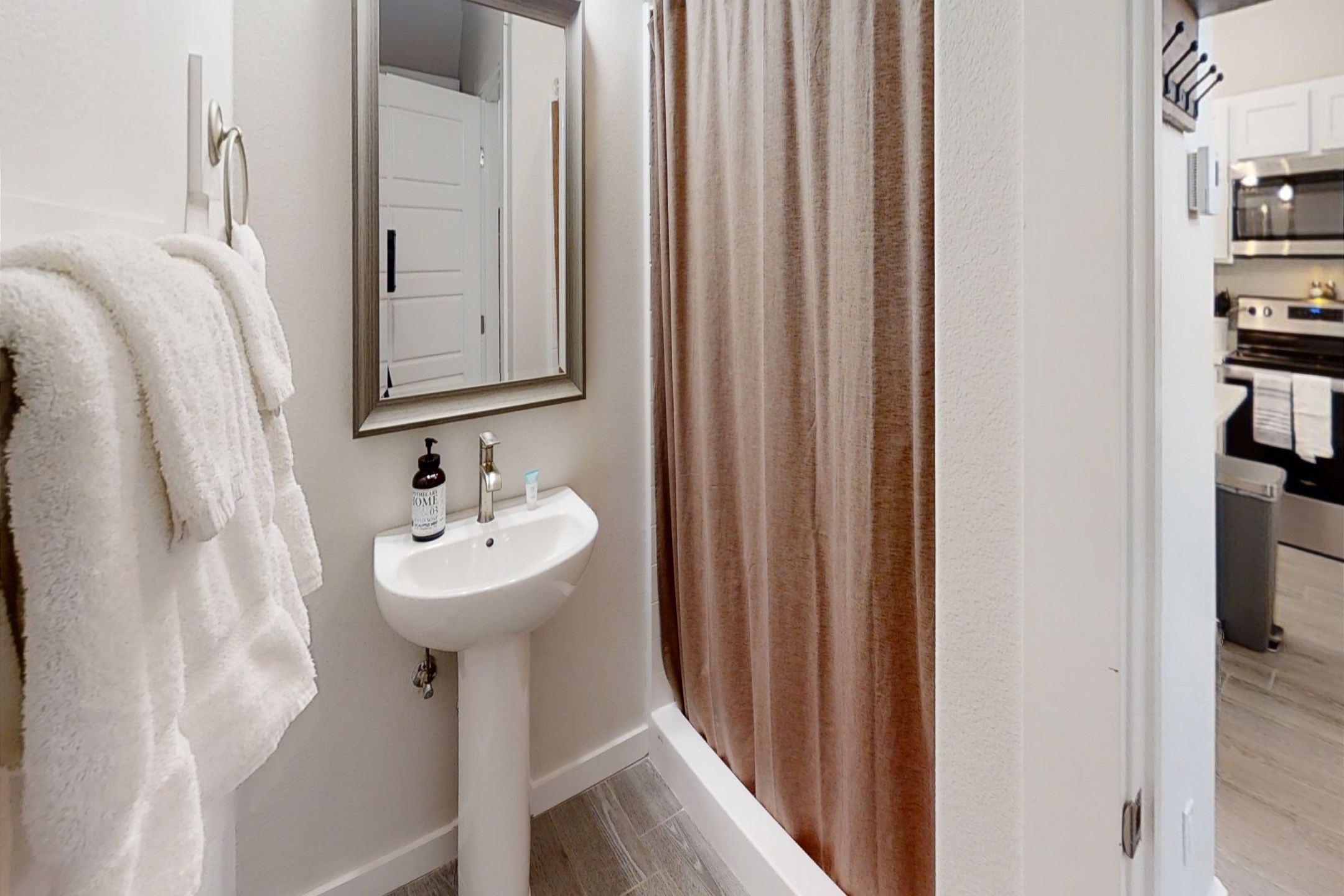 Guest bathroom on the first floor with walk in shower 