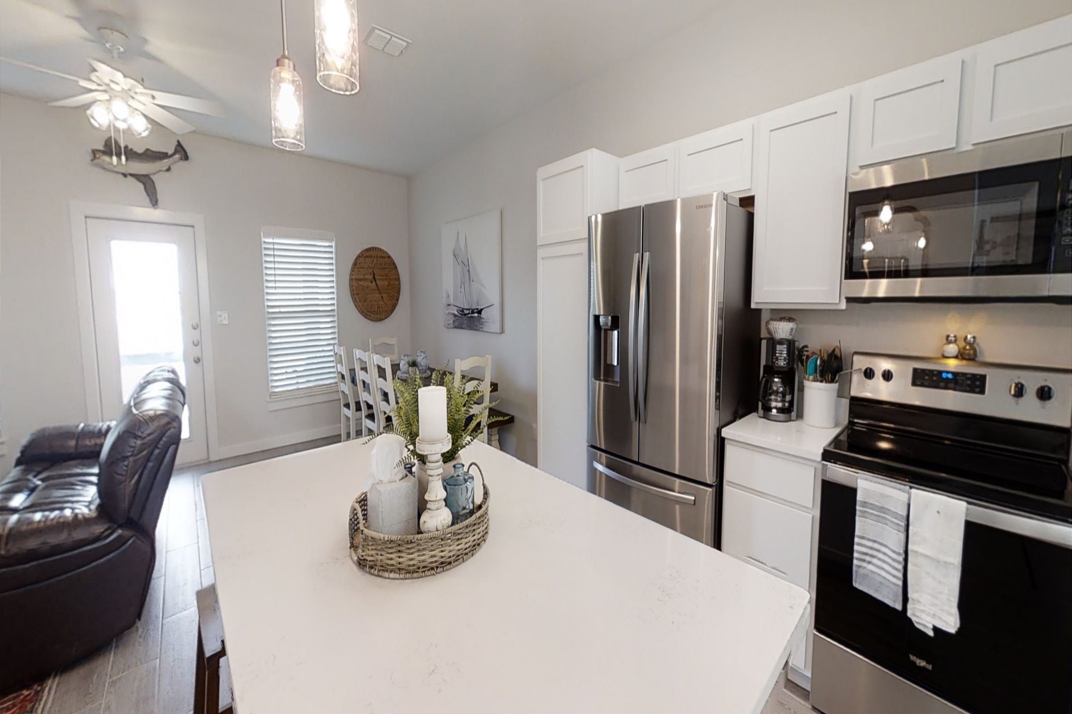 Open-concept layout connecting the dining area to the kitchen
