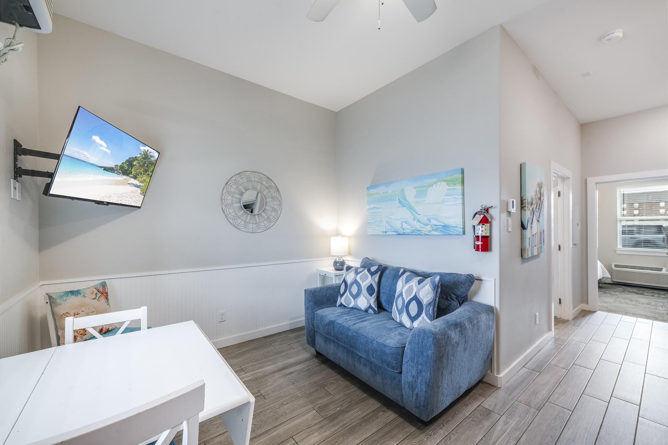 Cozy living area with twin sleeper sofa and flat screen TV