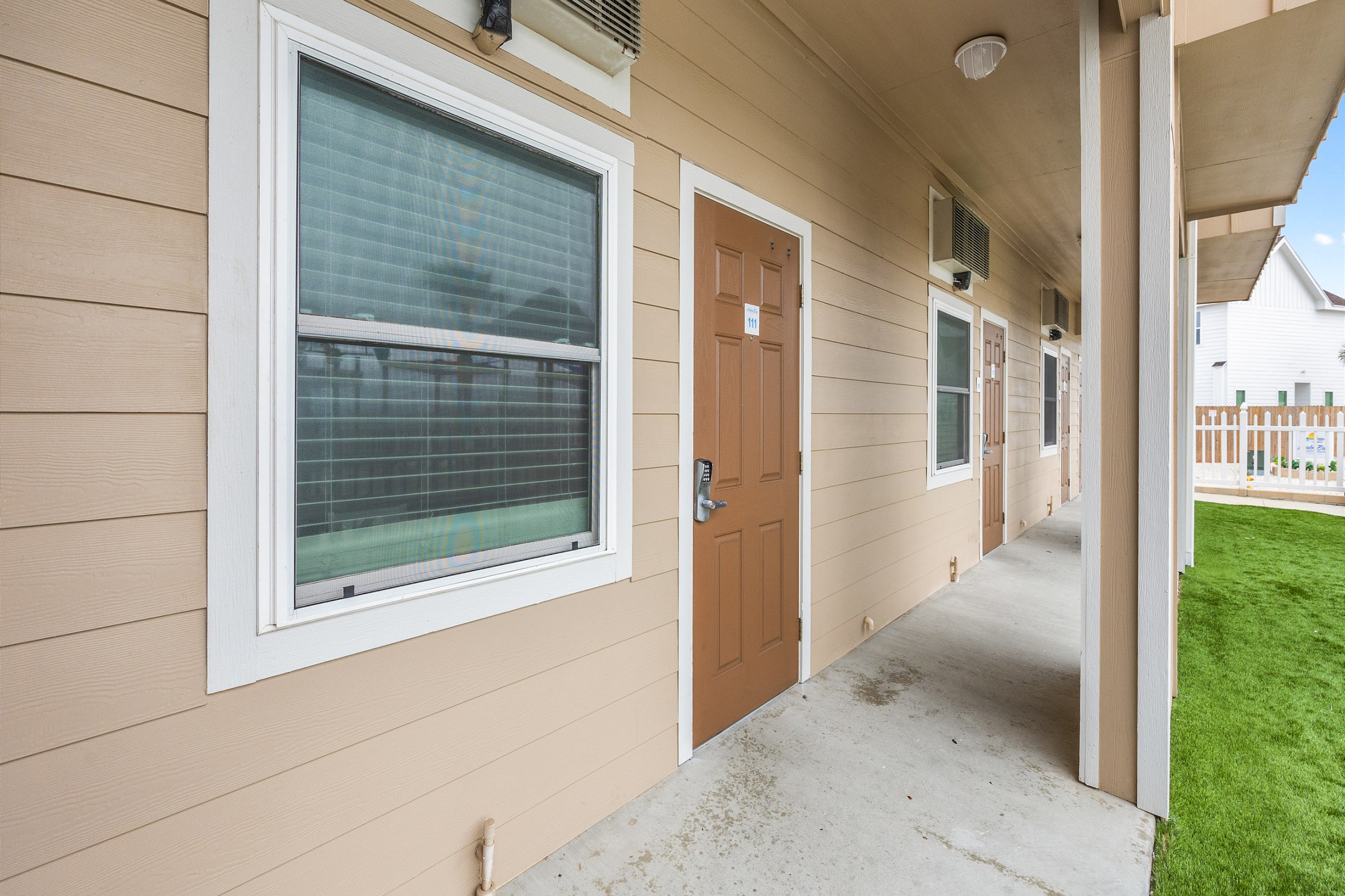 Front door to property with a coded door lock for added security