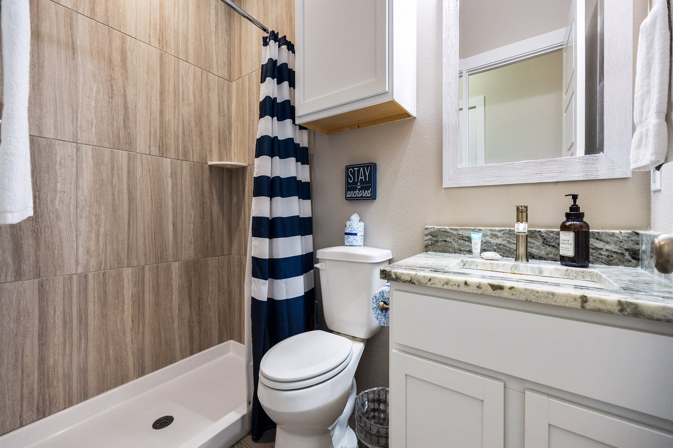 Master bathroom on the second floor with a sink and walk in shower 
