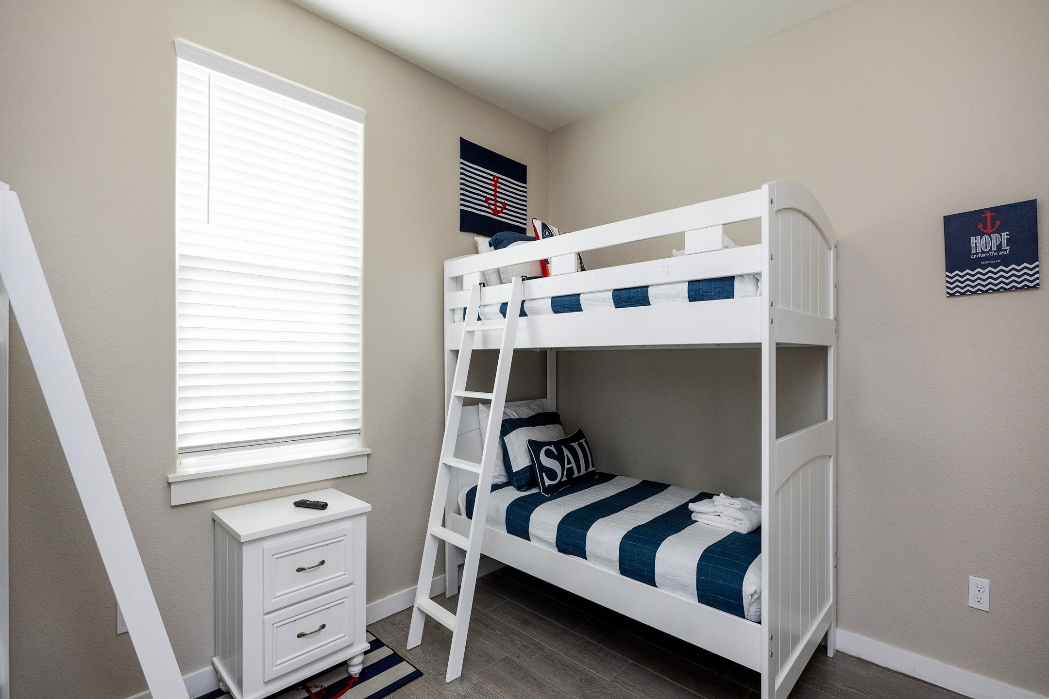 Third bedroom on the second floor with two sets of twin size bunk beds to accommodate four guests with flat screen TV