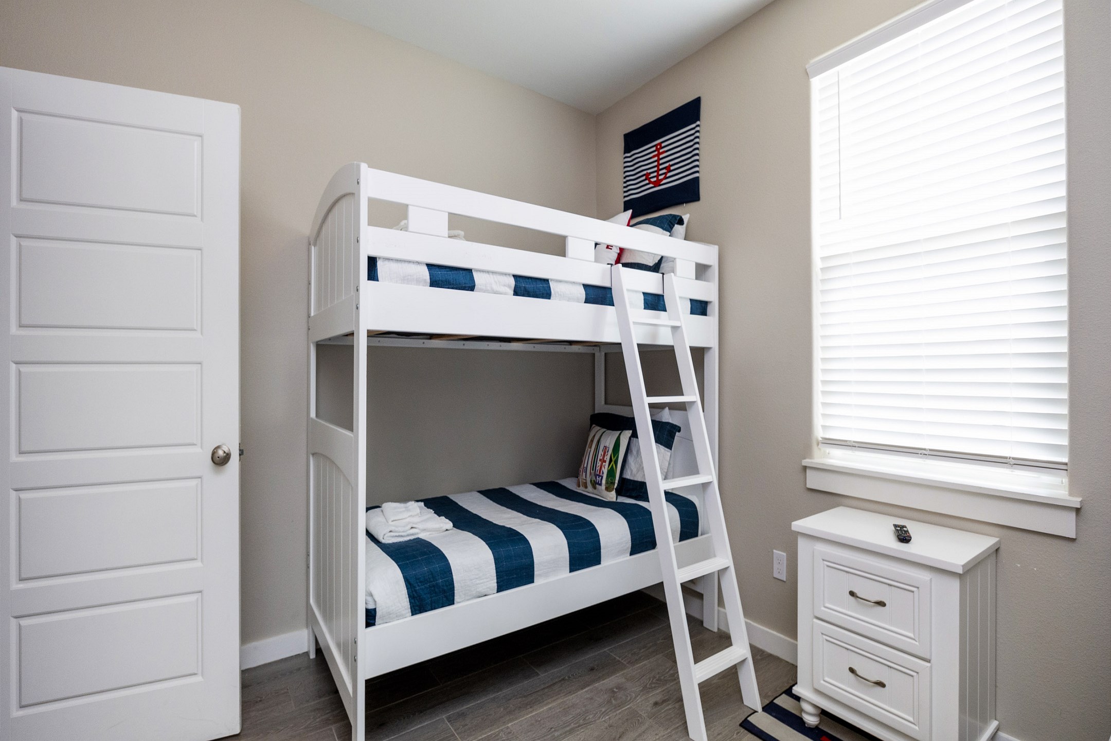 Third bedroom on the second floor with two sets of twin size bunk beds to accommodate four guests with flat screen TV
