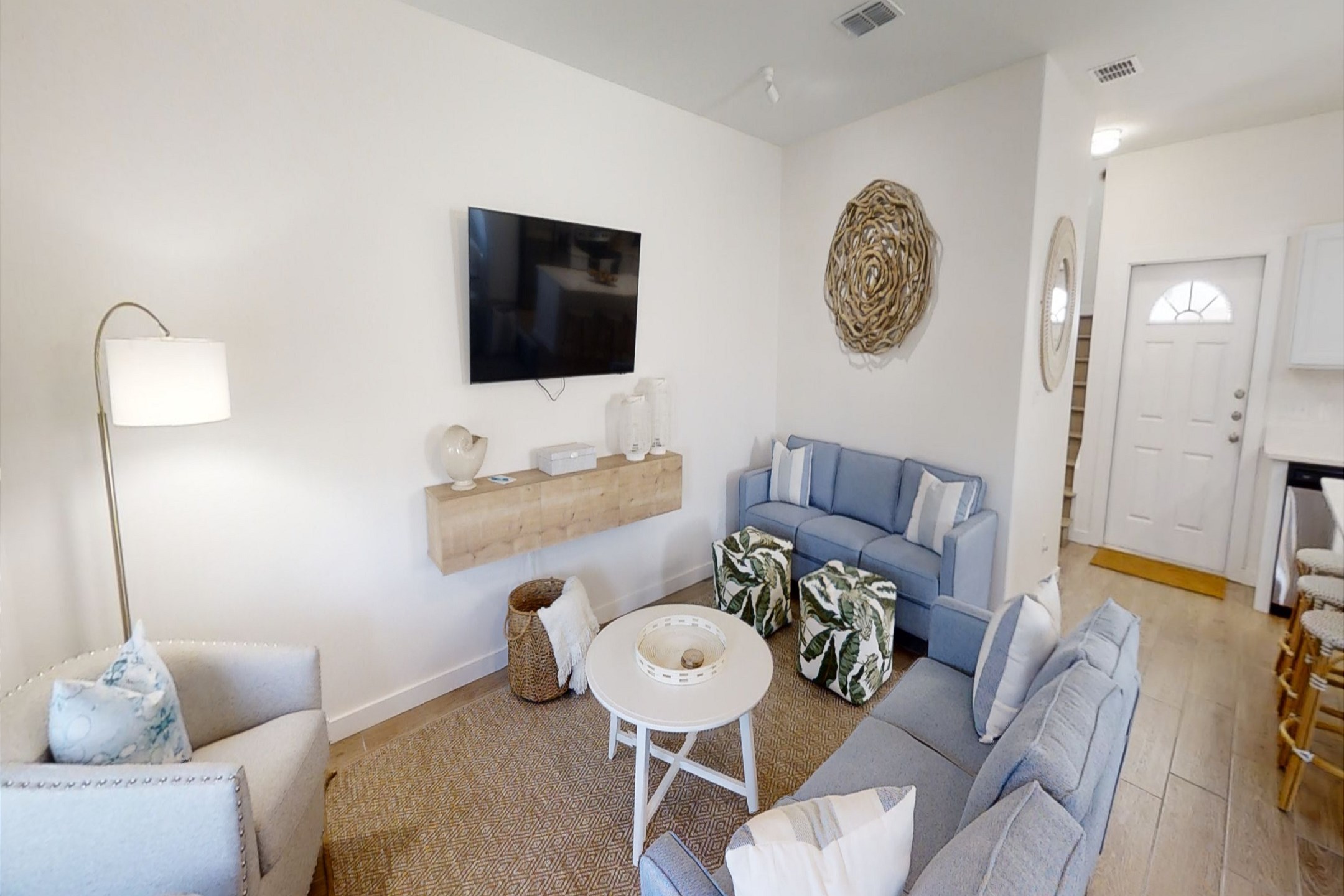 Inviting living space filled with natural light and generous seating for family comfort