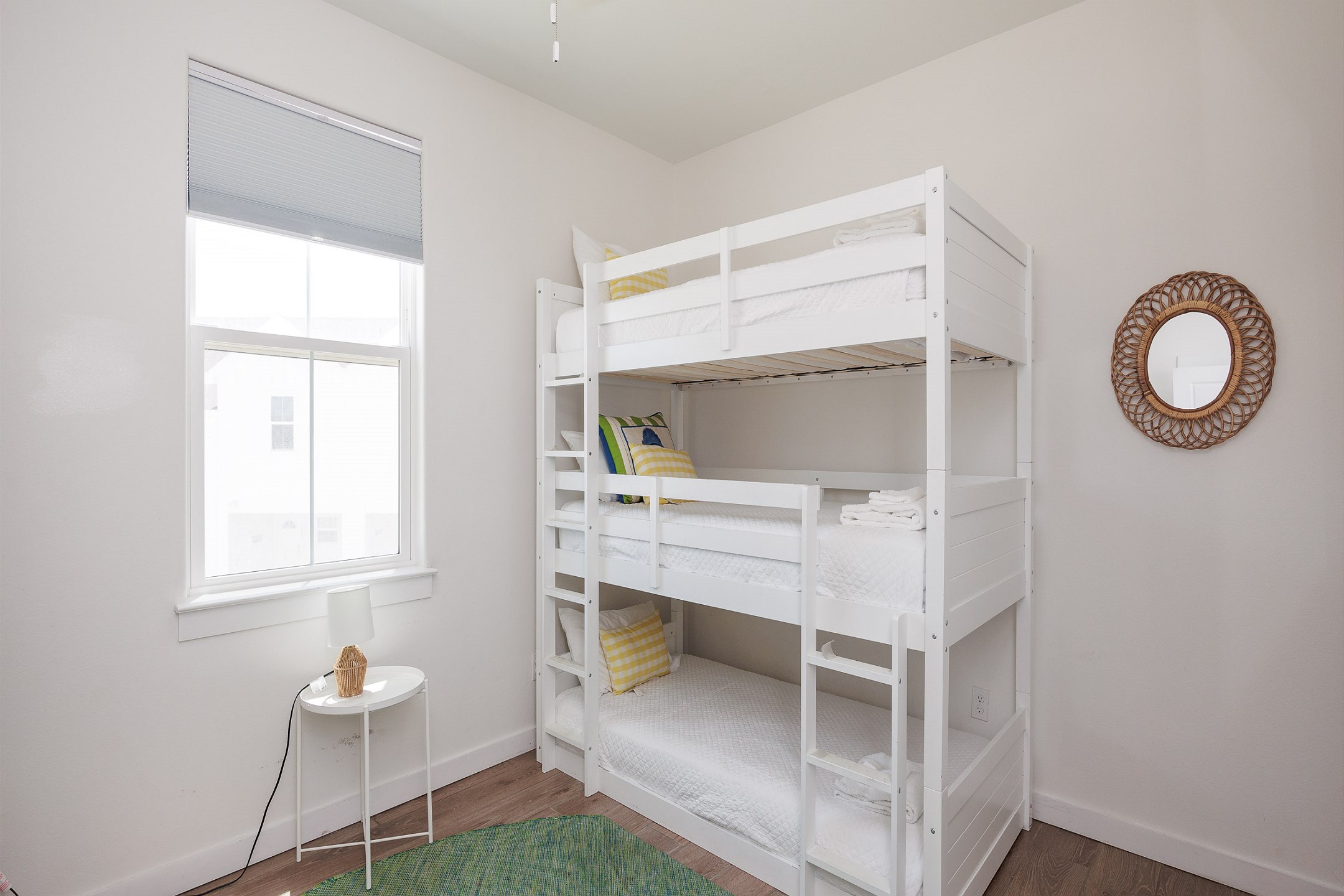 Third bedroom on the second floor featuring two sets of triple twin bunk beds, perfect for kids or groups