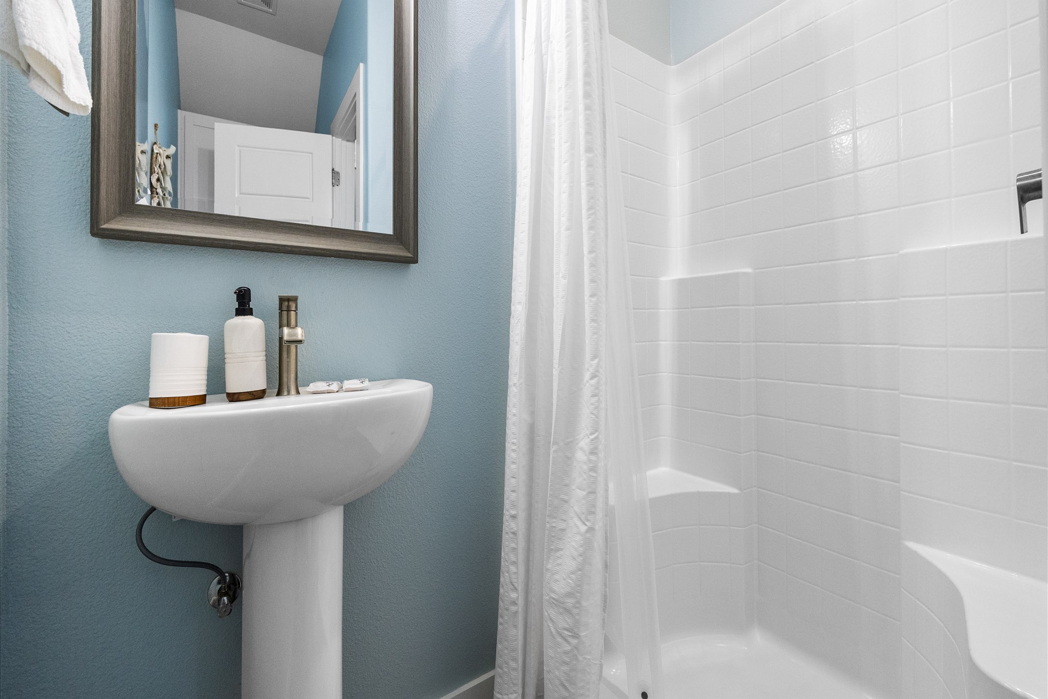 Guest bathroom on the first floor with walk in shower 