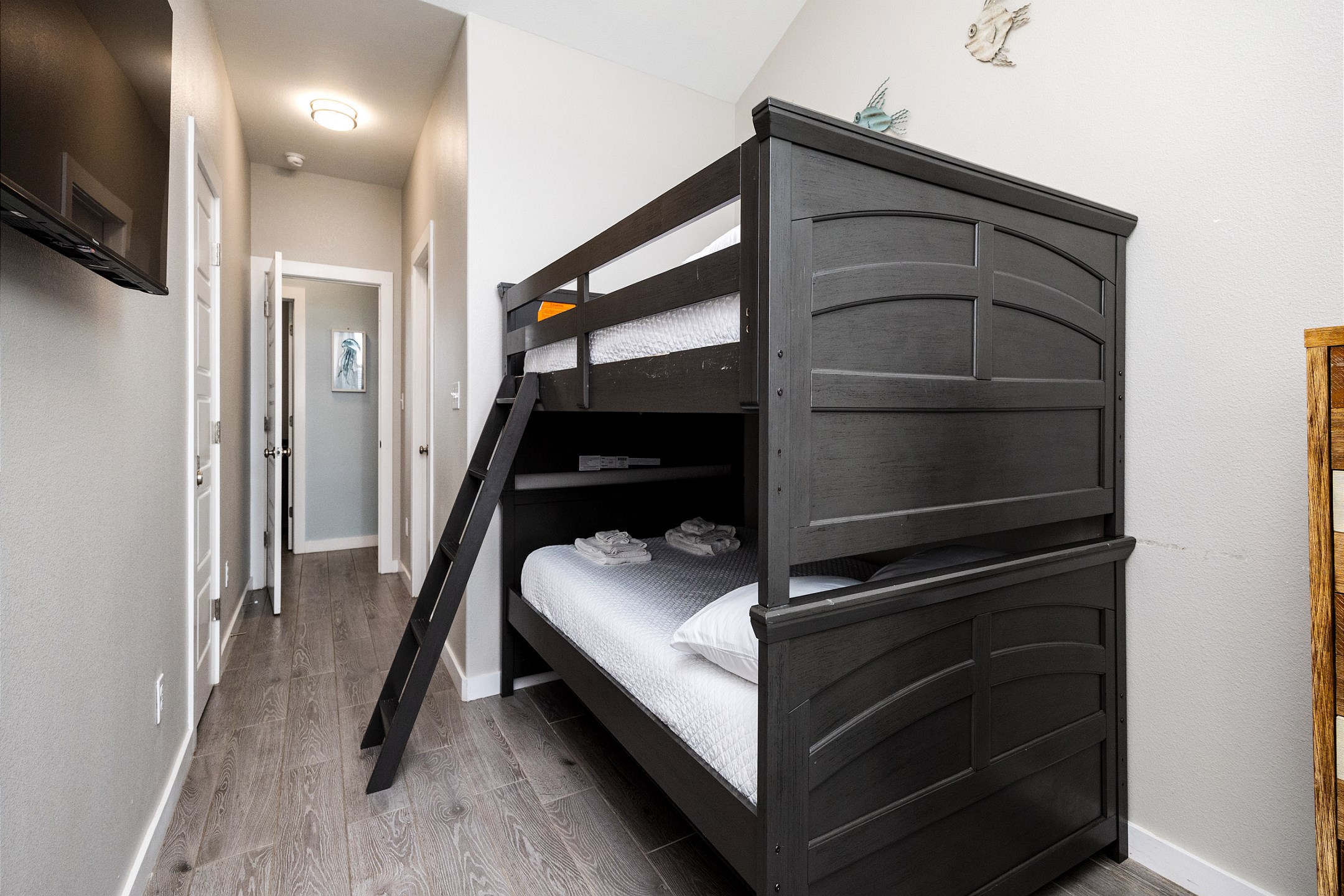 Third bedroom on the second floor with full over full size bunk bed and flat screen TV 