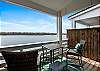 Master bedroom private balcony with chairs to relax and enjoy the Texas breeze 