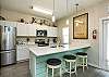 Beautiful kitchen Island with bar stools for entertaining 