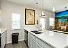 Bright kitchen Island with plenty of counter space 