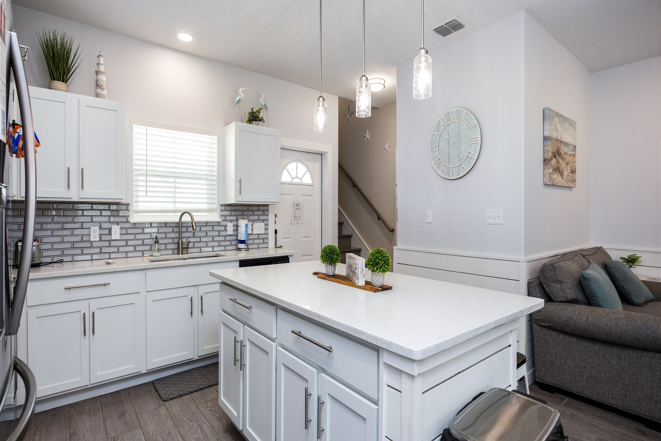 Chic kitchen featuring granite countertops and an expansive layout ideal for cooking and dining