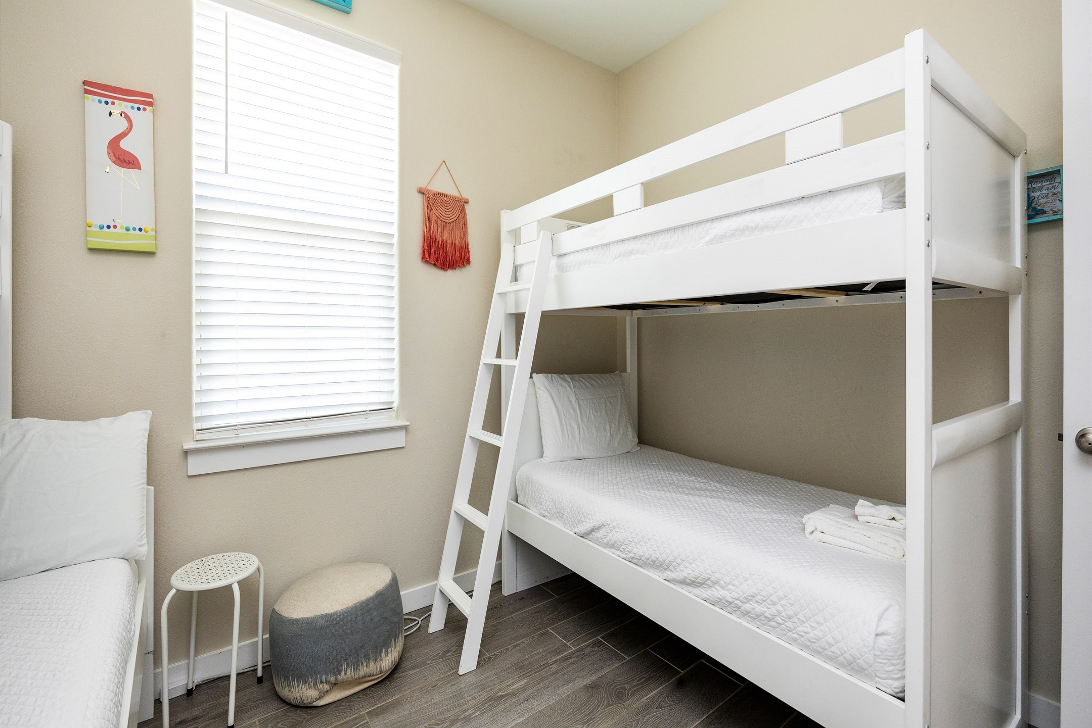 Third bedroom on the second floor with twin over twin size bunk bed, twin over full size bunk bed with twin trundle and flat screen TV to enjoy