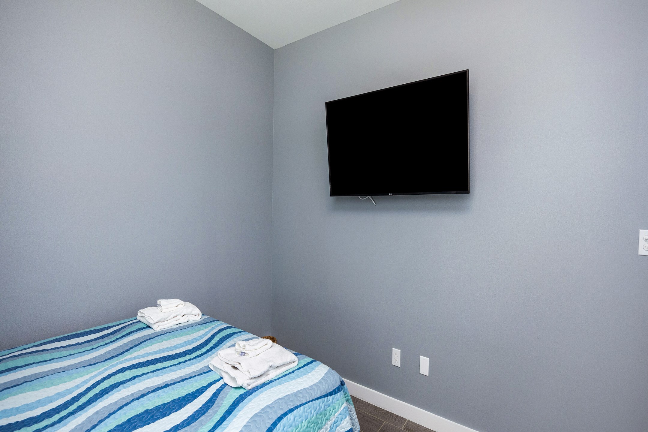 Second bedroom on the second floor with two queen size beds and a flat screen TV