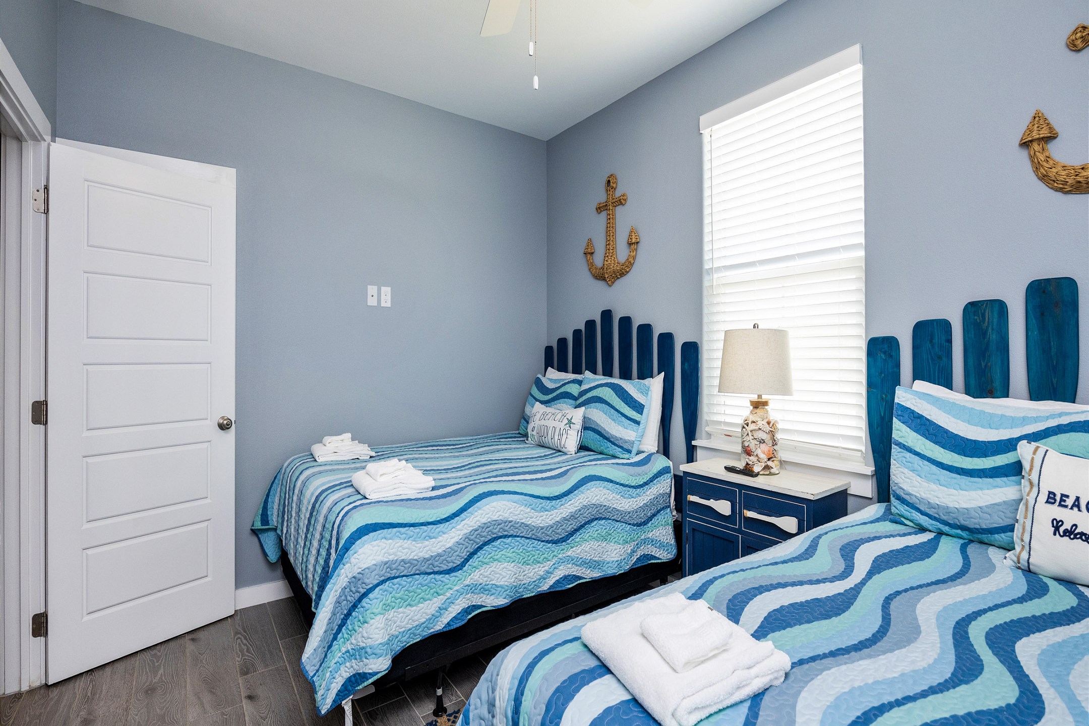 Second bedroom on the second floor with two queen size beds and a flat screen TV