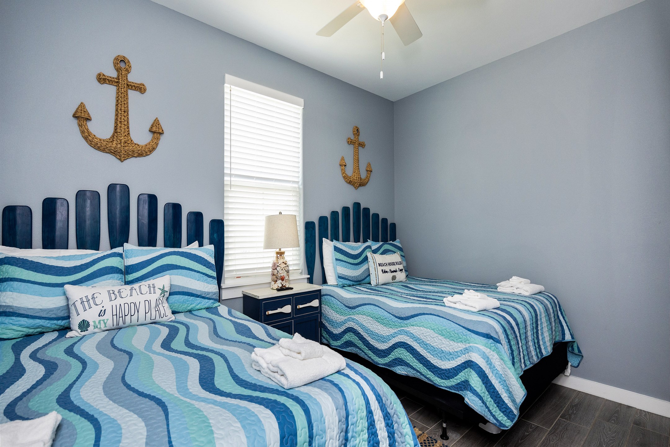 Second bedroom on the second floor with two queen size beds and a flat screen TV