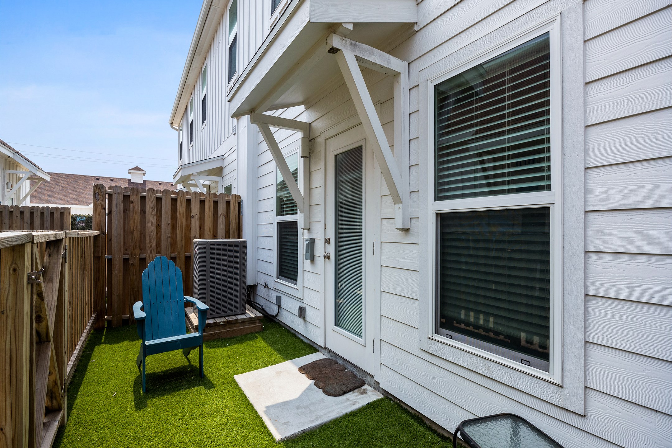 Private patio with turf grass 