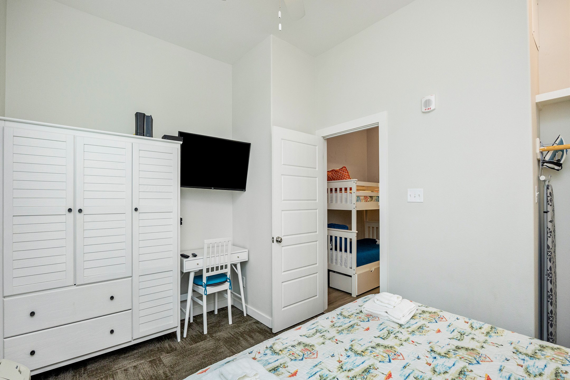 Charming master bedroom with king size bed and flat screen TV