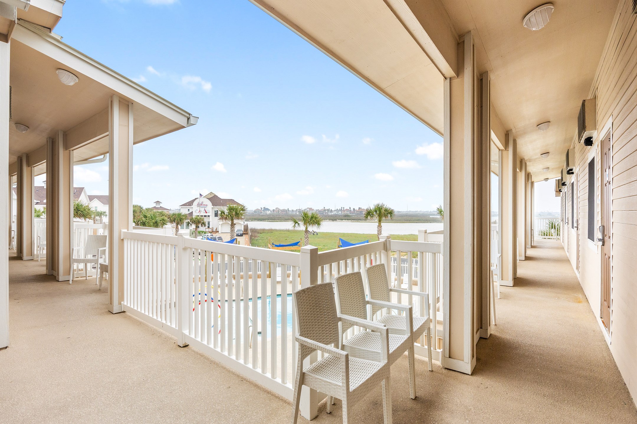 Front entrance to property on the second floor with chairs 