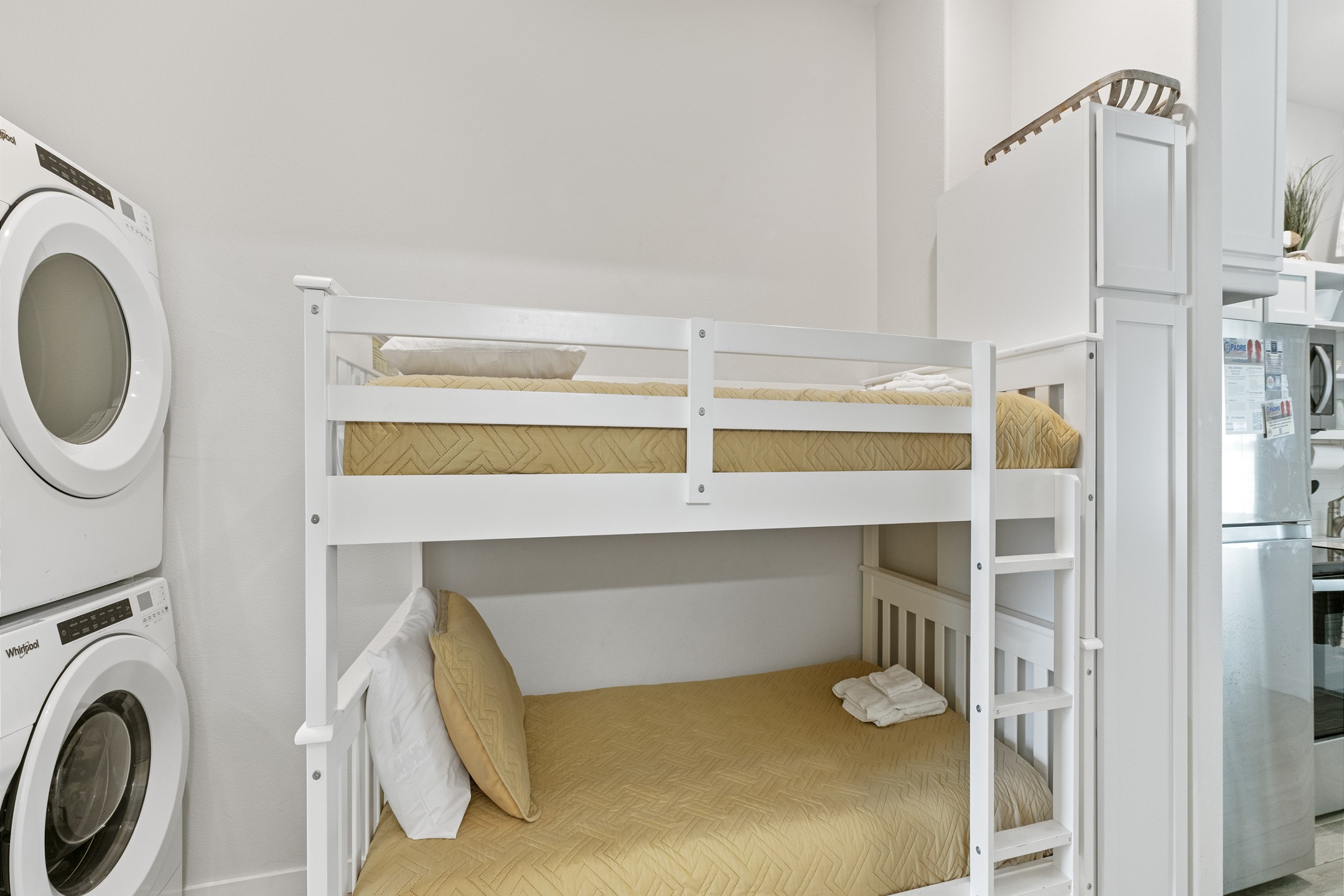Twin size bunk beds with washer and dryer for added convenience 