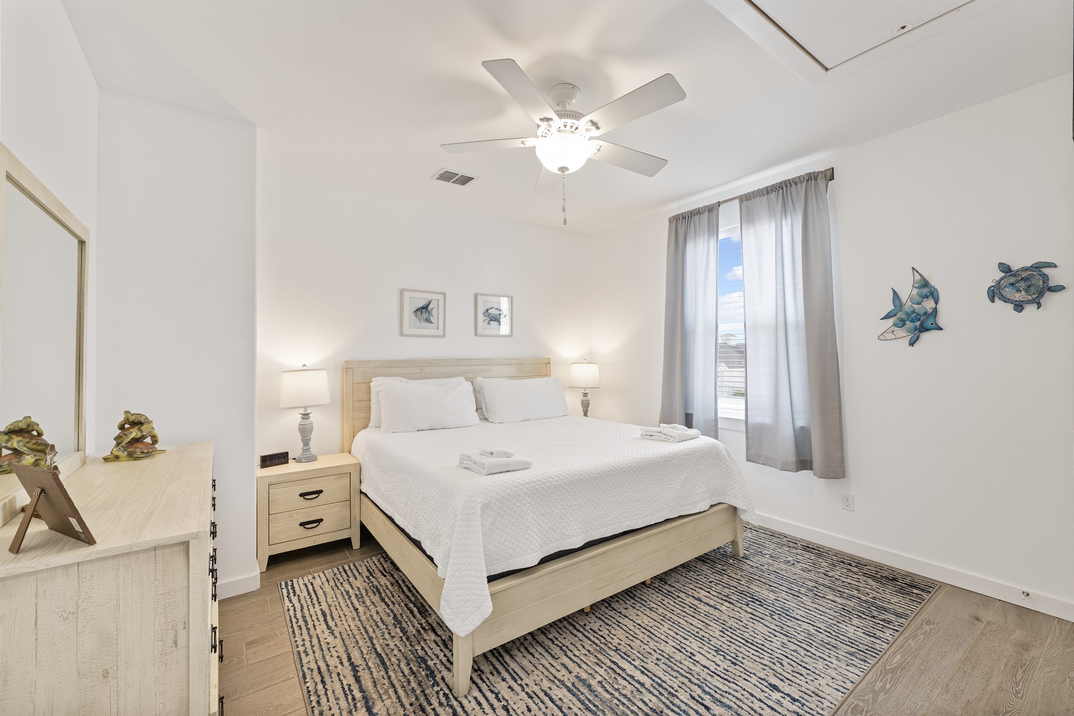 Second bedroom on the second floor with king size bed and flat screen TV 