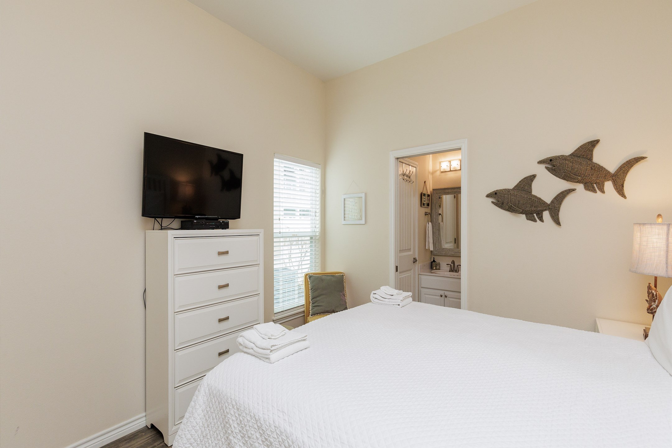 Master bedroom with king size bed, private bathroom and flat screen TV