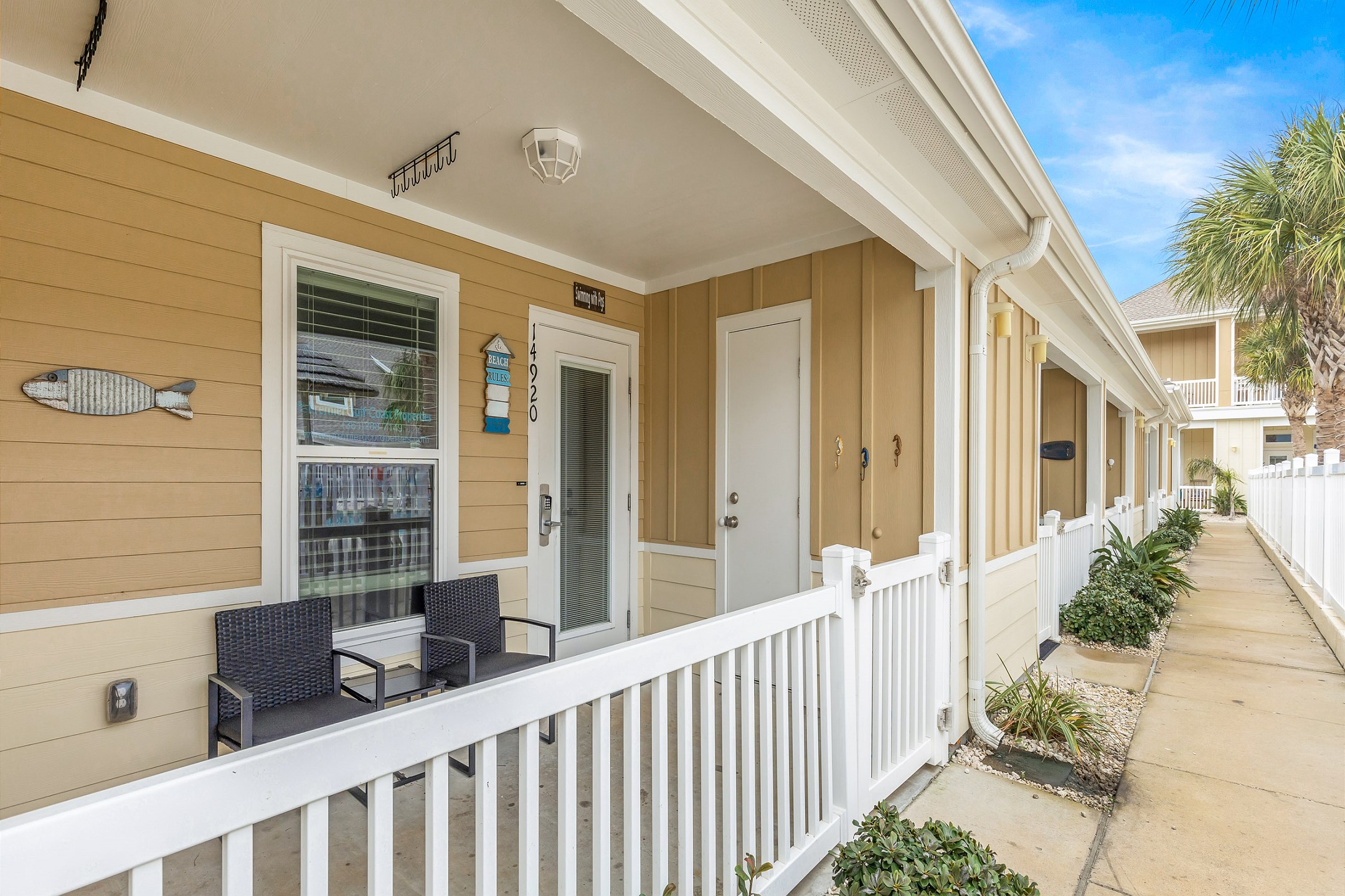 Private front patio facing complex pool