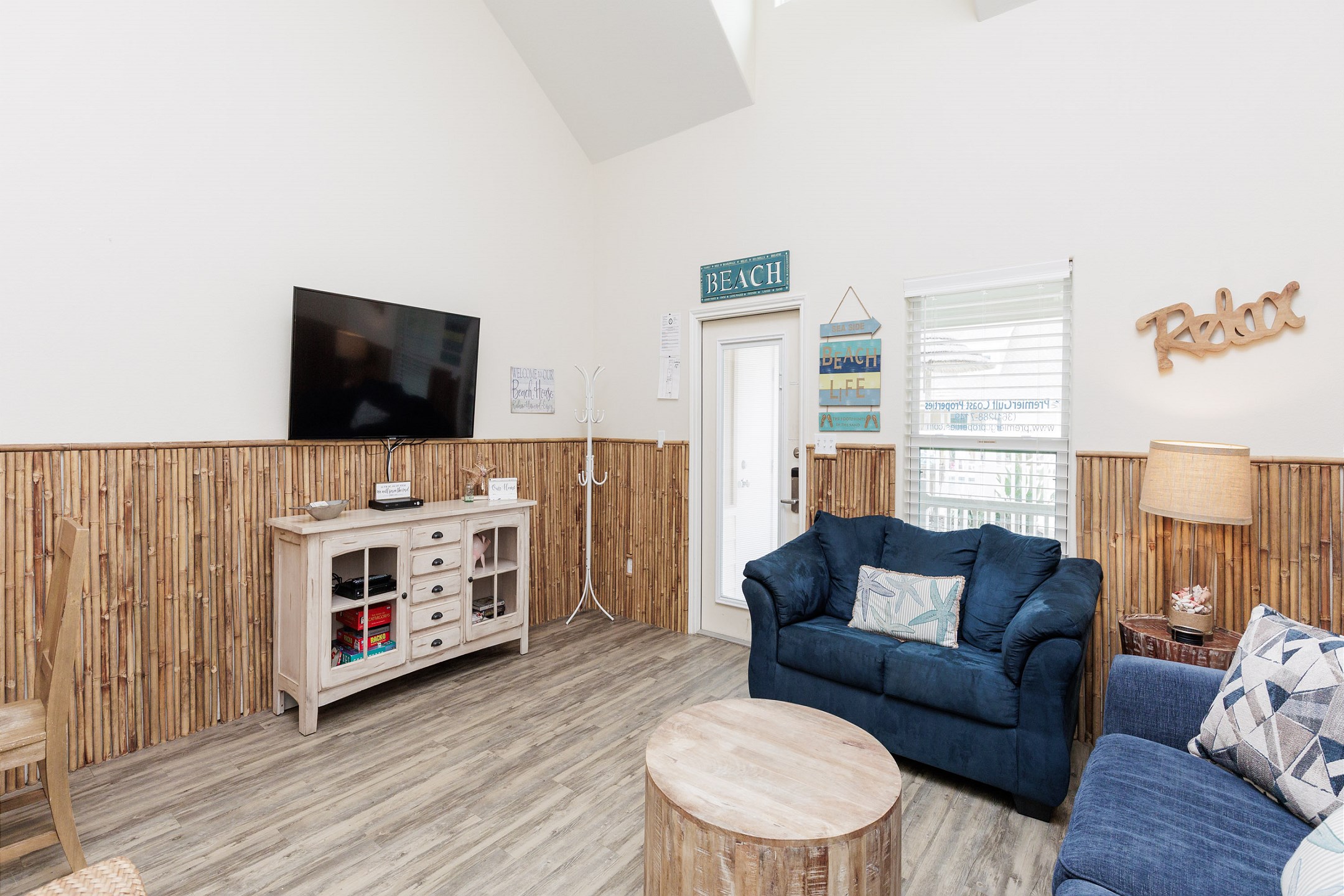 A cozy spot for movie nights with a sleek flat-screen TV, streaming services, and comfy places to kick back and relax