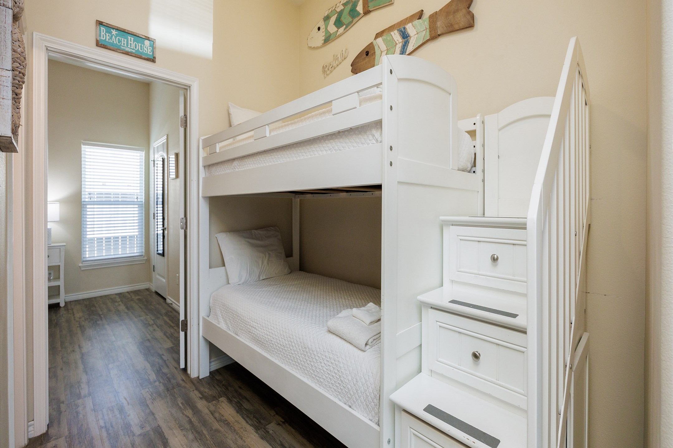 Twin over twin bunk bed in the hallway