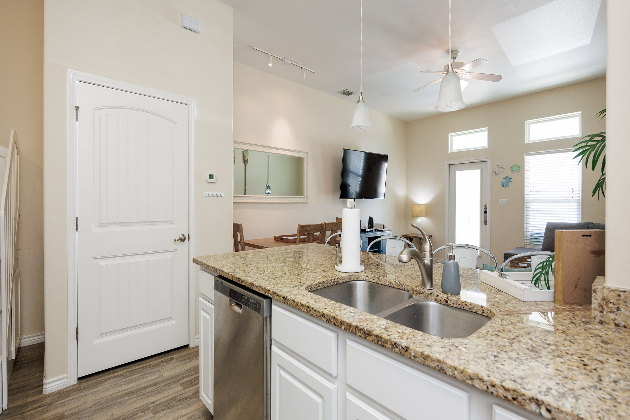 Coffee maker, toaster, cookware, dinnerware, and other kitchen essentials provided