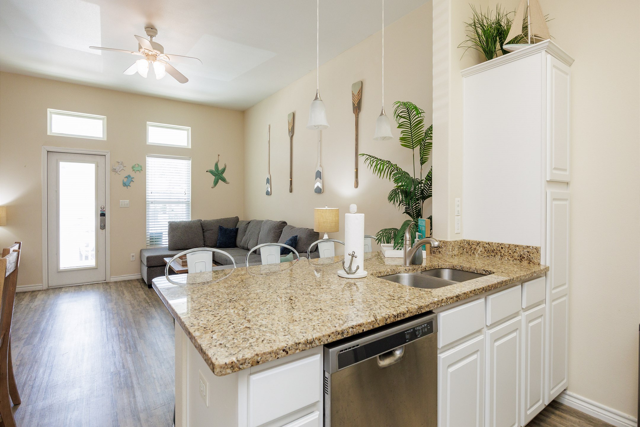 Open layout connecting the kitchen to the living and dining areas