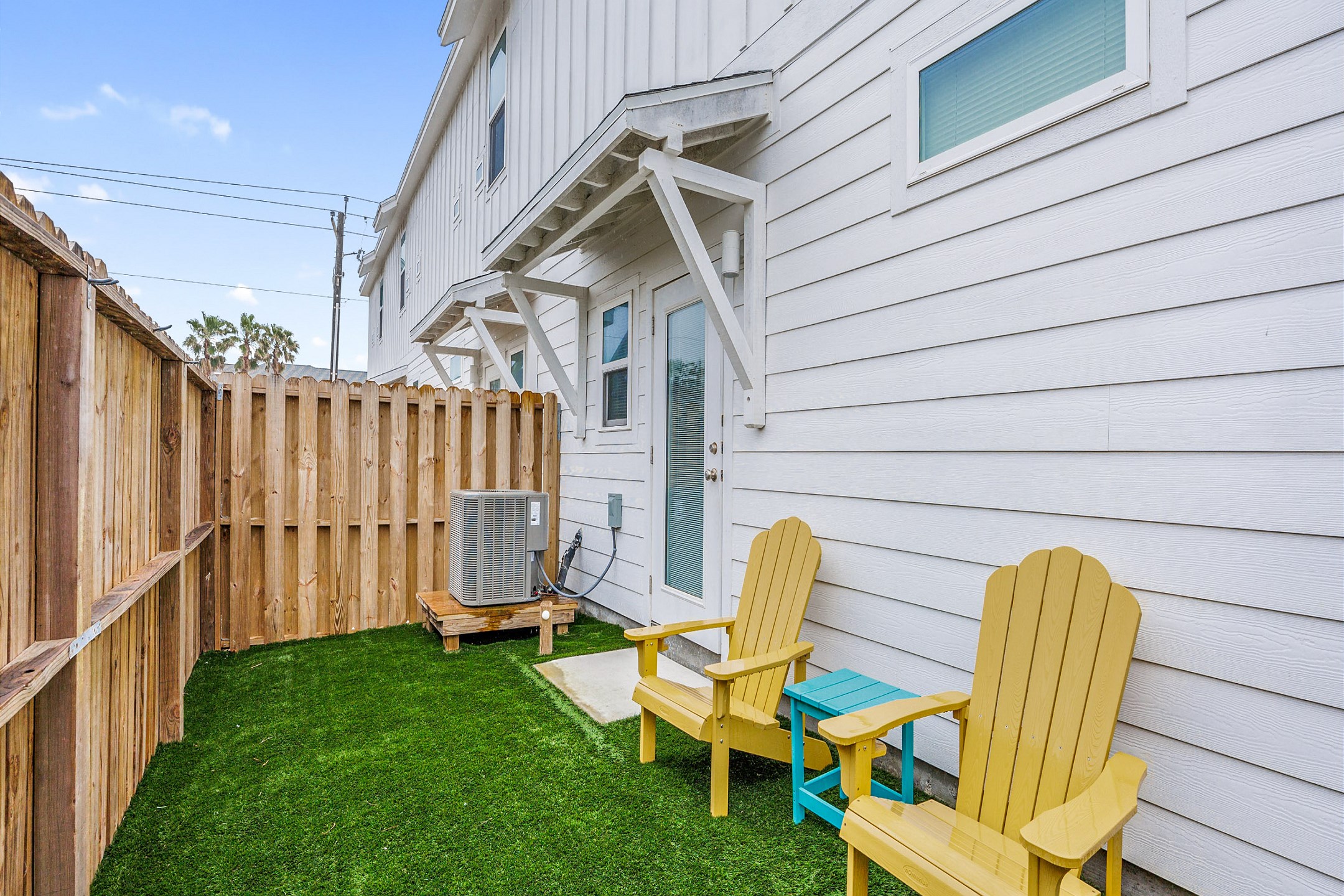 Private backyard area with turf grass to enjoy
